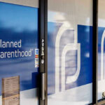 Planned Parenthood office entrance with logo and signs
