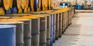 Rows of oil barrels in a storage facility