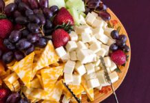 Metal Fragments Found — 1.5M Bags A colorful cheese and fruit platter featuring various cheeses and fresh fruits