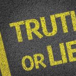 Yellow text on a black surface asking Truth or Lie?