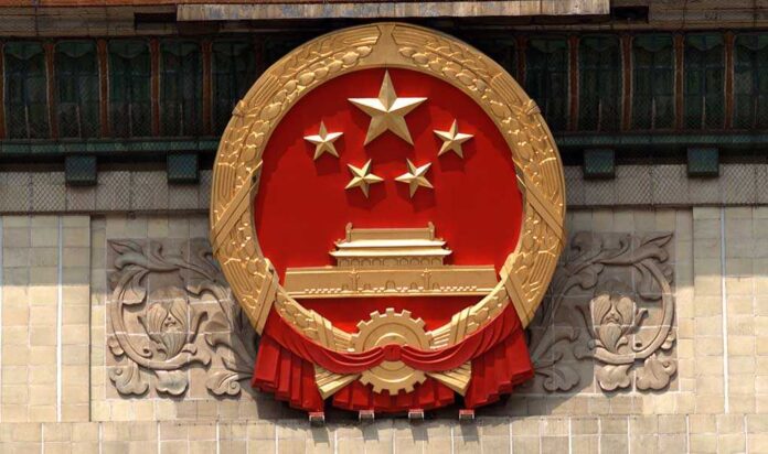 National emblem of China displayed on a government building