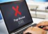 Laptop screen displaying a 'Page Blocked' error message