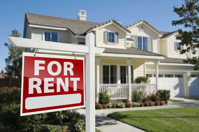 shutterstock_73089751.jpg A house with a For Rent sign in the front yard