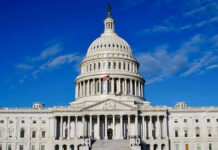Congressman CAUGHT Hiding Illegal From Federal Agents US Capitol Building against blue sky.