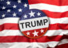 Button with Trump on American flag.