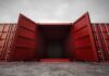 Open red shipping container with a view into the empty interior