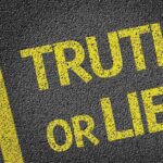 Yellow text on a black surface asking Truth or Lie