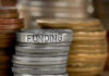 Trusted Fund’s HIDDEN $3M Klan Ties REVEALED Stack of coins labeled funding with other coins stacks
