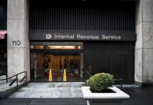 Massive $1.7B Deal: Trump’s IRS LAWSUIT TWIST Entrance of the Internal Revenue Service office with signage