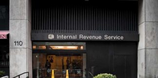 Entrance of the Internal Revenue Service office with signage