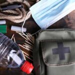 FIRST EVER: Military Parachute Medical Drop Stuns World An assortment of emergency supplies including a first aid kit, water bottle, face mask, and matches