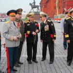 Zelensky’s SHOWDOWN –Moscow WARNED Group of military officers in uniforms holding flowers in Red Square