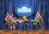 MAGA Civil War Erupts Over Iran Multiple microphones at White House press briefing podium.