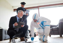 Domestic Violence Crisis Exposed Forensic team examining evidence at a crime scene indoors.