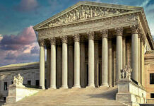 Arrests Reported After Verdict at Texas Courthouse Building with columns and statues in front of entrance.