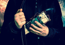 Weak Oversight Nuclear Work Sparks Concern Person holding a homemade explosive device.