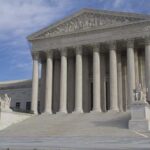 Appeals Showdown: Leader’s Name Comes Down The Supreme Court building featuring large columns and statues