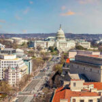 New Election Claims Put White House Narrative at Odds Washington, D.C. skyline with Capitol Building in background.