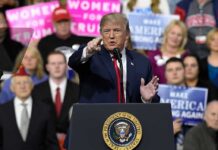 Trump Says ‘Rigged Elections.’ Networks Say ‘No Live Coverage politician speaking at a rally podium