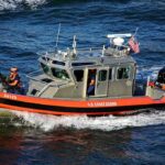 Deadly Sea Strikes, Same Drug Problem U.S. Coast Guard patrol boat speeding on open water