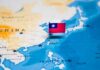Red Terror Warning: Beijing’s Long Arm Taiwan flag pin on map of East Asia