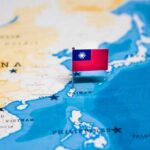 Red Terror Warning: Beijing’s Long Arm Taiwan flag pin on map of East Asia