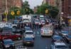 Man Fighting for Life After Police Recruiter’s Car Strike Police vehicles and officers block a city street during an active scene