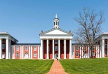 Neoclassical red-brick college building with white columns and cupola