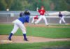 The Pitcher Who Became the Name Behind Baseball’s Lifeline Young baseball player in blue uniform preparing to run on the field