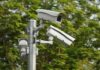 China’s Surveillance Tech Goes Global surveillance cameras mounted on a metal pole