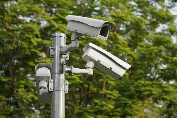 surveillance cameras mounted on a metal pole