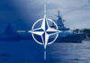 U.S. Secures Permanent Military Access to Greenland NATO emblem overlaying naval ships in the ocean.
