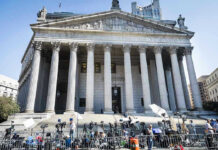 Butler Shooting Victim Dies After Two-Year Struggle Reporters and photographers gathered outside a neoclassical courthouse