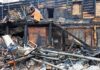 Horror In Gaza: 21 Dead in City Collapse Burned building facade with charred debris