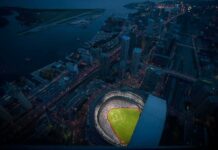 Historic Faceplant: Angels’ Historic Losing Season Ends Baseball stadium illuminated at night in a coastal city