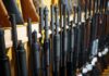 New Bill Could Put Some Airguns Under Federal Gun Rules Shotguns and rifles lined up on a rack in a gun store