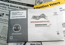 Mail-in ballot envelope and voter information materials
