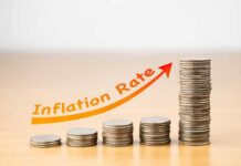 Inflation Hits 3.7% as Gas Prices Surge stacks of coins increasing with upward arrow