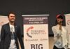 Protest Erupts at Trump Jr. Appearance Curro Savoy at a TPUSA event with another speaker on stage