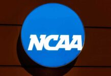 NCAA Lawsuit Dismissed Over Federal Funding Rule NCAA logo on a blue circular sign