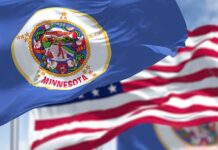 Minnesota state flag waving in the wind