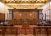 Courtroom interior with judge's bench and wooden furnishings
