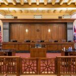 Courtroom interior with judge's bench and wooden furnishings