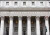 Federal Probe: Pre-Dawn Raid Hits Omar United States courthouse facade with Corinthian columns