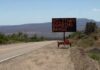 Montana Could Become a Weapons Testing Hub Portable electronic road sign on desert highway shoulder