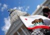 Becerra Leads as Hilton Demands More Exposure California state flag in front of a white domed capitol building